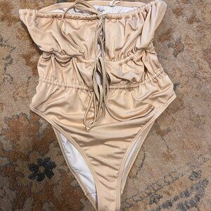 Urban Outfitters champagne strapless tie one piece swimsuit